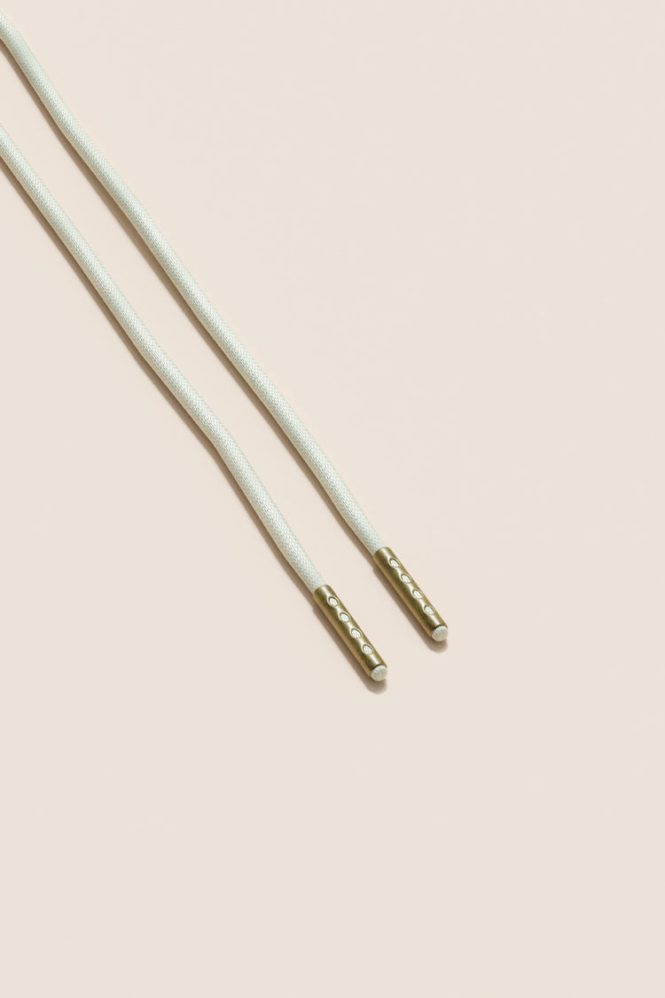 Senkels Off White 2.5mm Round Waxed Shoelaces with Brass Aglets